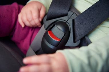 child-in-car-seat-showing-buckle-and-harness
